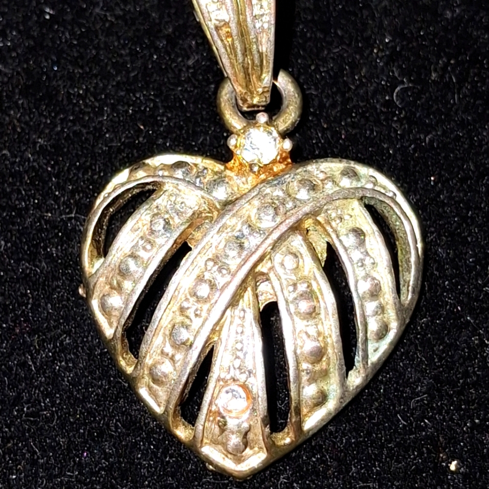 Three pendants and two necklaces all for 15.00